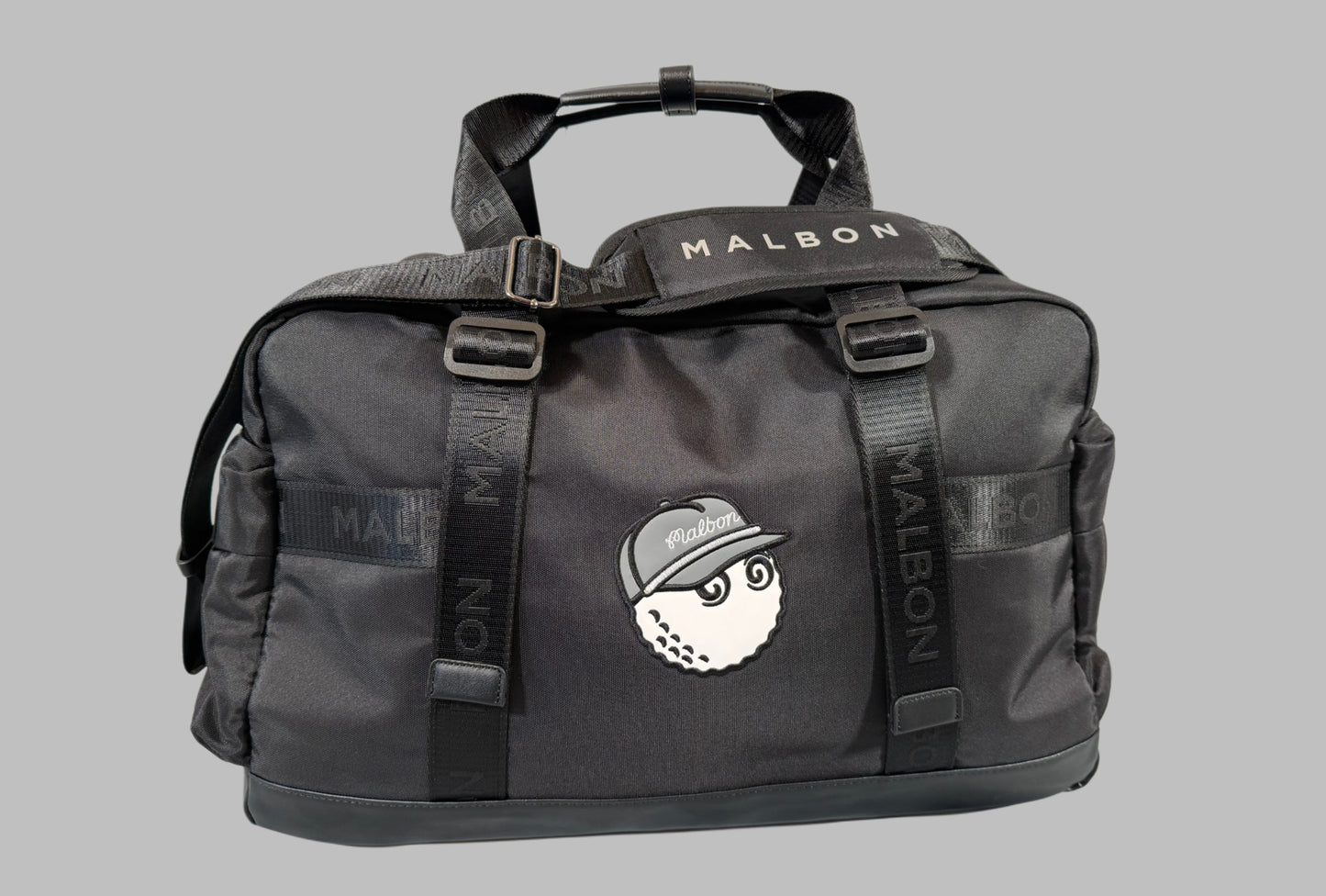 Black duffel bag with 'MALSON' branding on a gray background