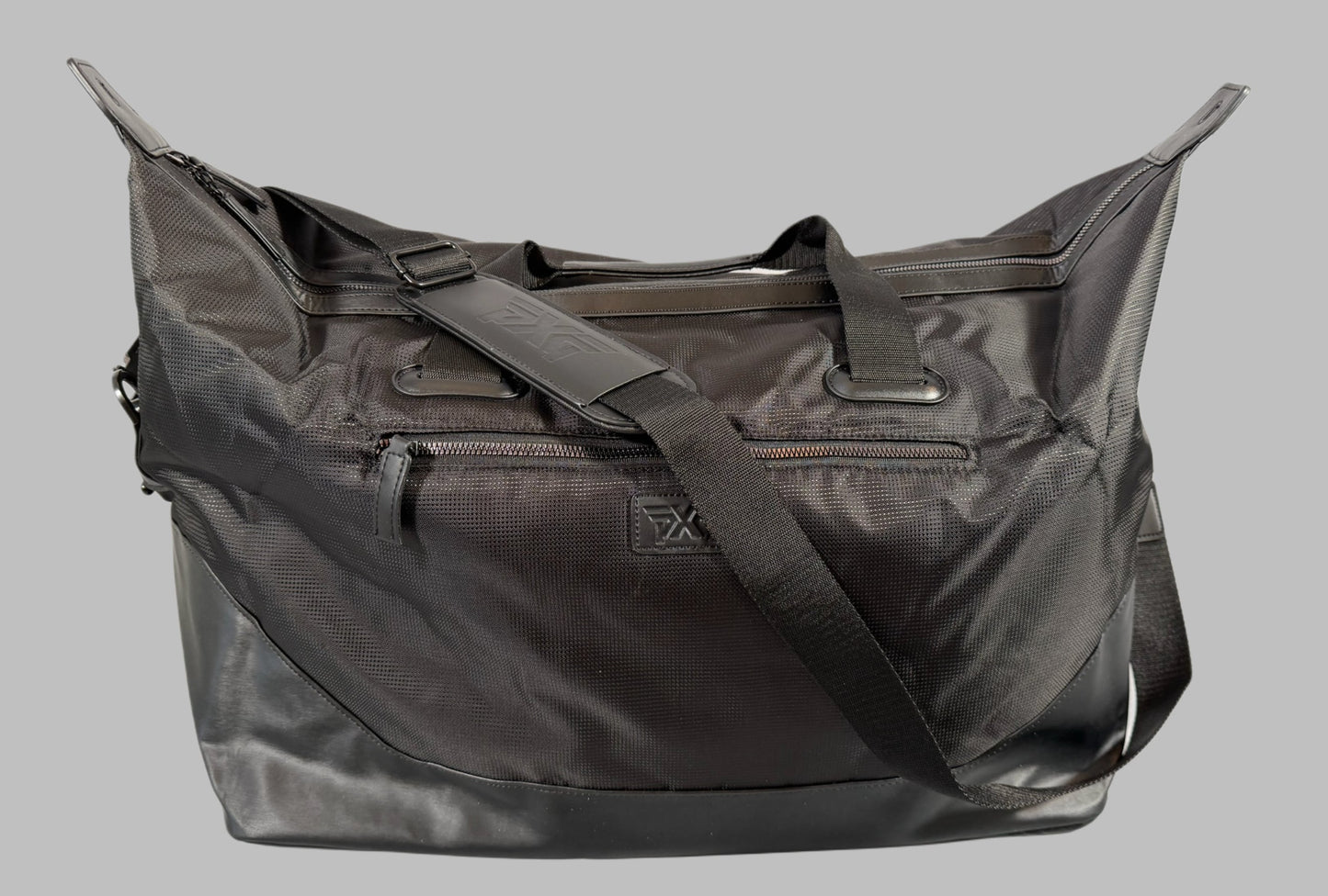 Black shoulder bag on a gray background